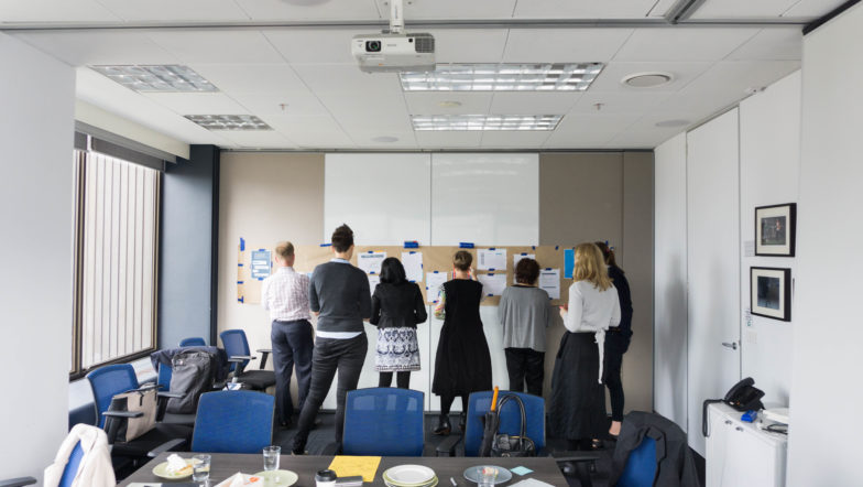 Image of people designing smart legal services